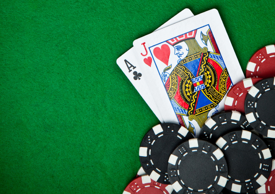 Black and red poker chips in the background.